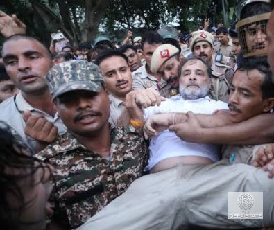 Delhi Police detain Rahul Gandhi during the Opposition sit-in outside Prime Minister Narendra Modi's residence in New Delhi.